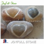 Heart on stone ornaments