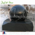Black marble sphere fountain