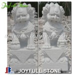 White marble fu dog statues