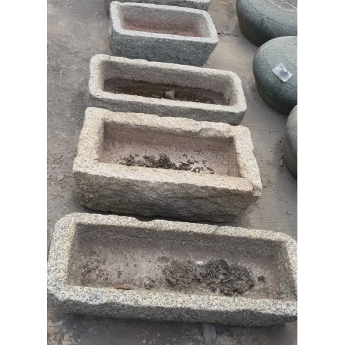 Old stone trough planters