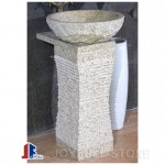 Yellow granite pedestal sink and basin