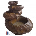 Carved stone waterfall fountain water feature