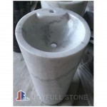 White marble pedestal sink