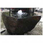 Outdoor boulder stone water features