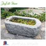 Old stone trough planters