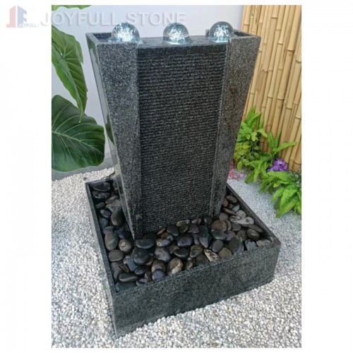 Fuente de pared de pilar ondulado rectangular de piedra